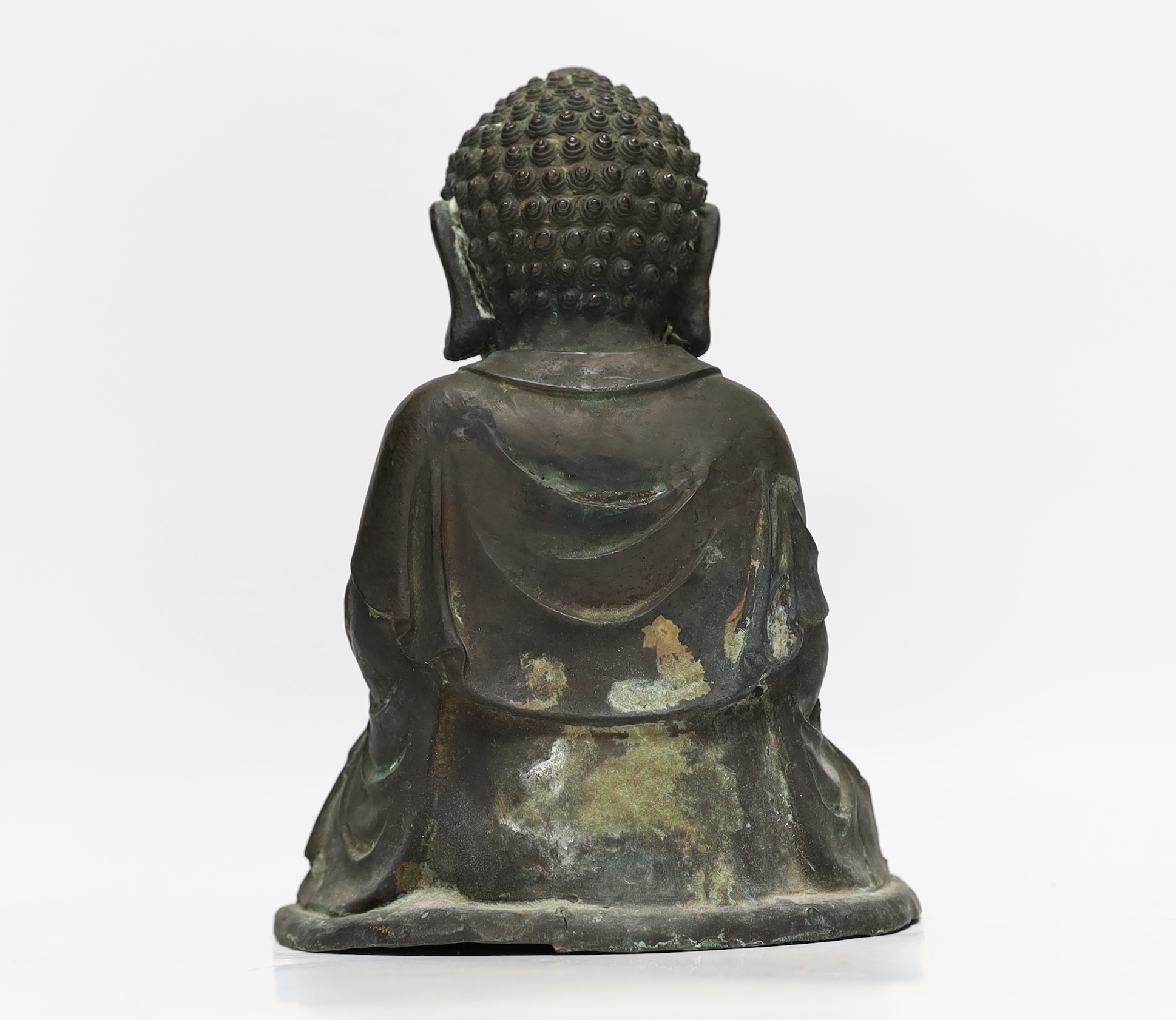 A Chinese bronze figure of Buddha Shakyamuni, Ming style, 25cm high